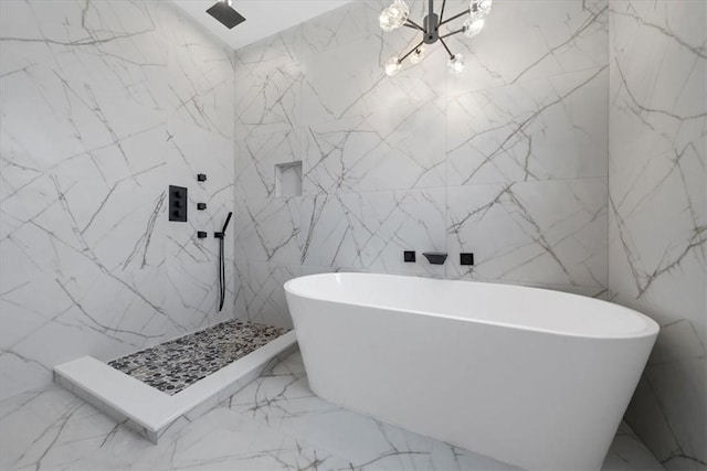3 Forshee St, Monroe, NY 10950 - full bathroom featuring tile walls, marble tiled floors, a chandelier, a soaking tub, and a marble finish shower