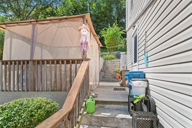 exterior space featuring a wooden deck