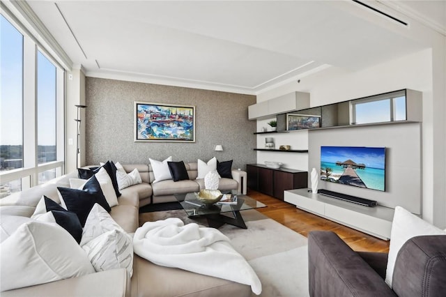 living room featuring light wood-type flooring and a wealth of natural light