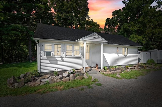 view of front facade with a yard