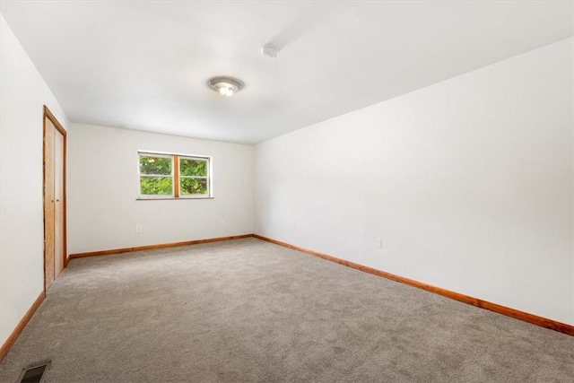 unfurnished bedroom featuring carpet floors