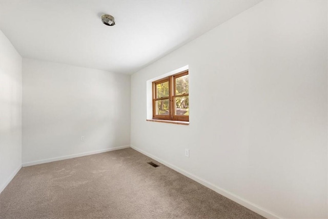 view of carpeted spare room