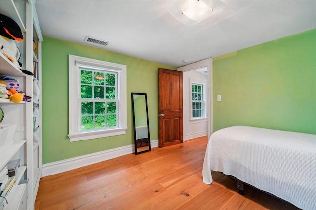 bedroom featuring light wood-type flooring