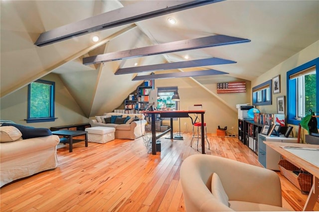 recreation room with light hardwood / wood-style flooring and lofted ceiling with beams