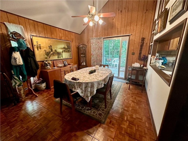 dining area with ceiling fan, lofted ceiling, and dark parquet flooring