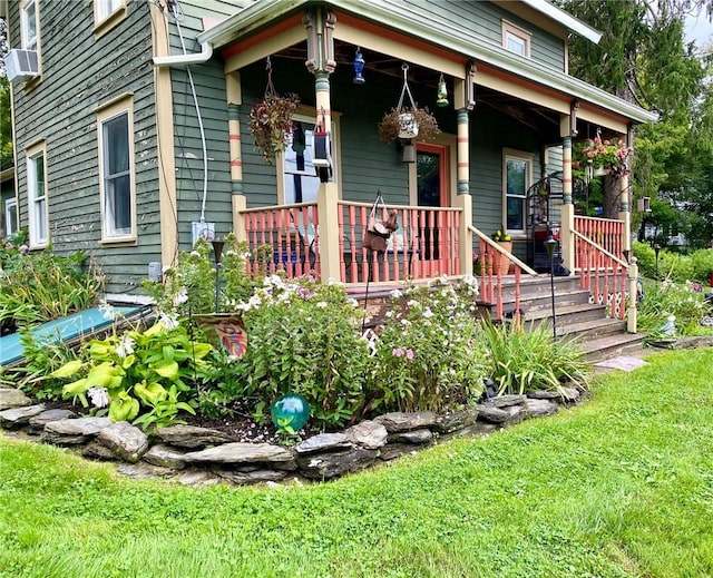 view of front of property featuring cooling unit and covered porch