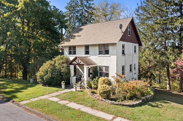 view of front of house with a front lawn