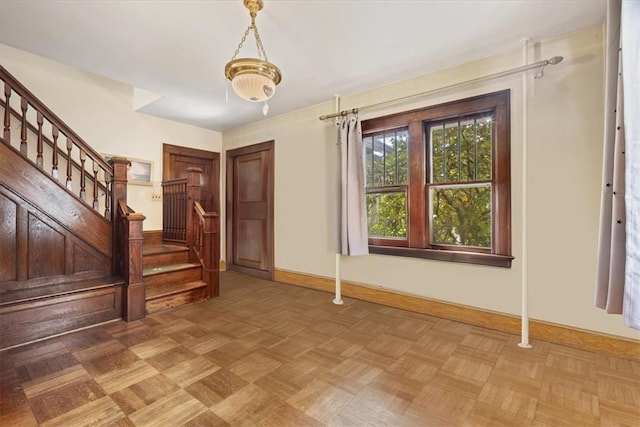 interior space featuring parquet flooring