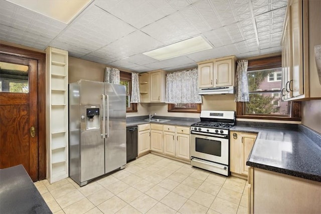 kitchen featuring gas range, sink, light brown cabinets, dishwasher, and stainless steel fridge with ice dispenser