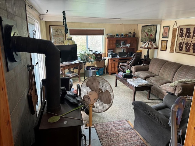 living room with carpet and crown molding