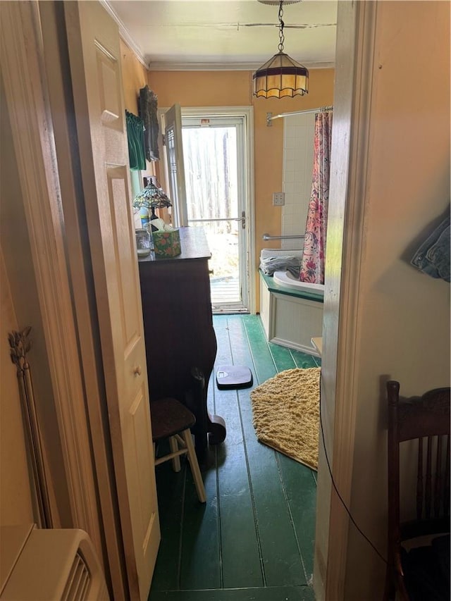 bathroom with tile patterned flooring and crown molding