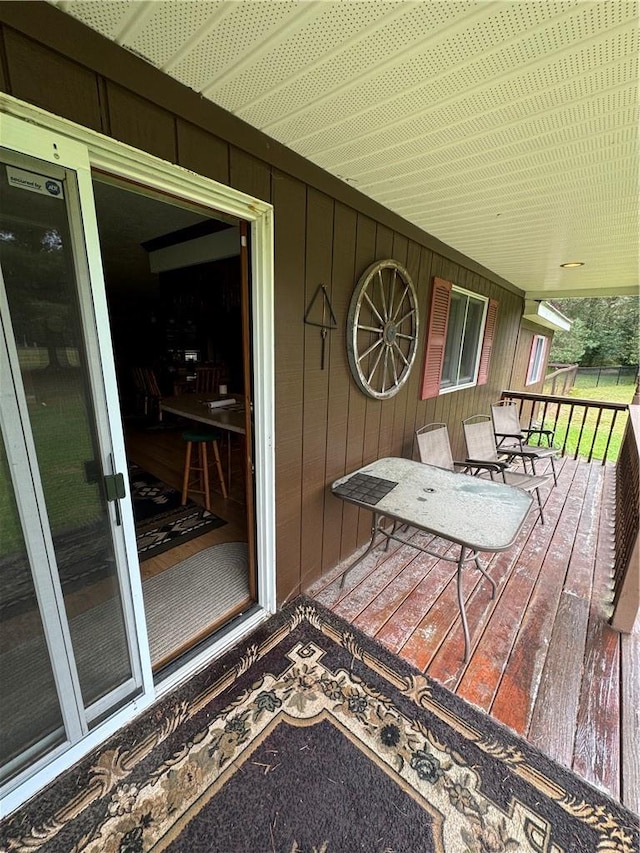 wooden deck featuring covered porch