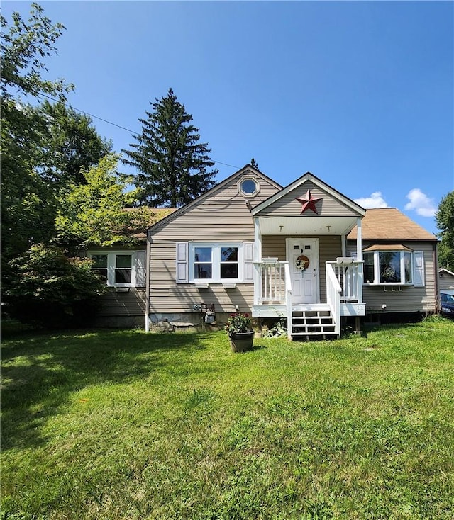 view of front of property with a front lawn