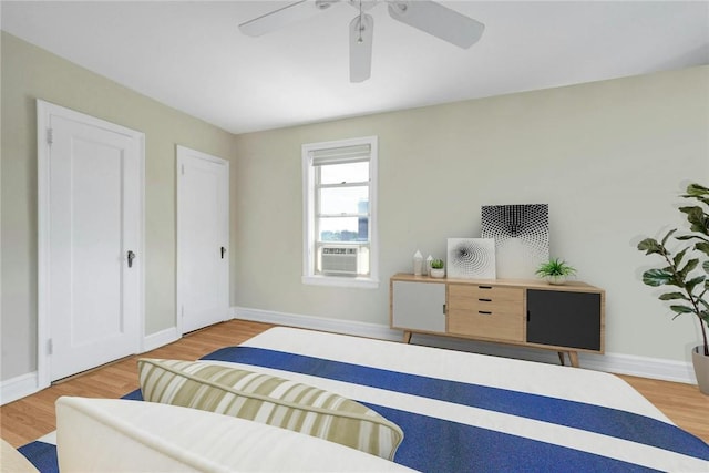 280 Bronxville Rd Unit 9B, Bronxville, NY 10708 - bedroom with wood finished floors, cooling unit, and ceiling fan
