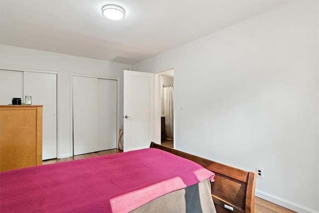 bedroom featuring hardwood / wood-style flooring