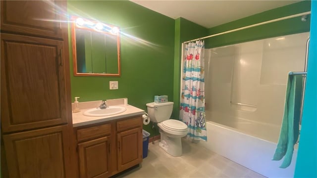 full bathroom with vanity, shower / bath combo, and toilet