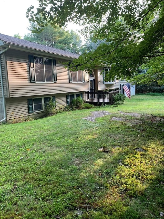 view of yard featuring a deck