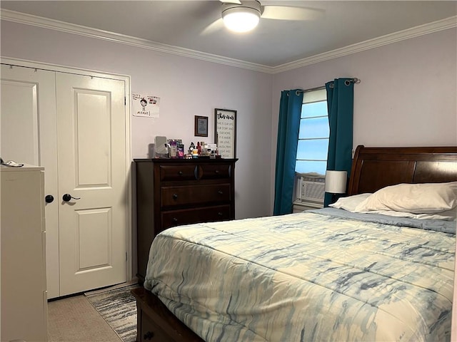 bedroom with ceiling fan, ornamental molding, light carpet, and a closet