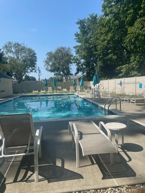 view of pool featuring a patio area