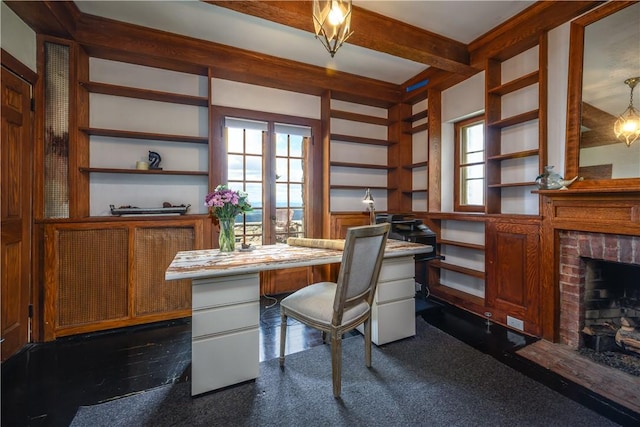 home office featuring plenty of natural light, beam ceiling, and a fireplace