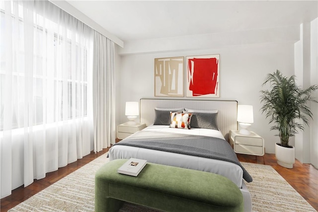 bedroom featuring multiple windows and dark wood-type flooring