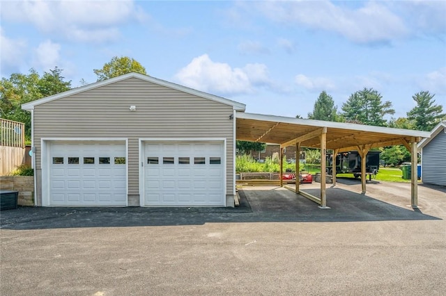 garage with a carport