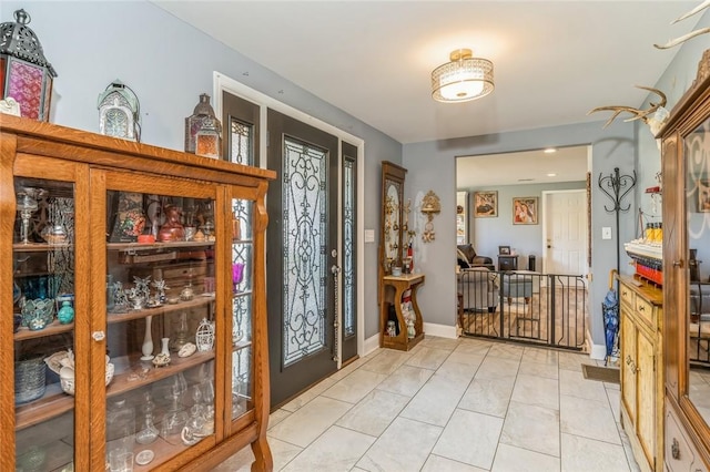 view of tiled foyer entrance