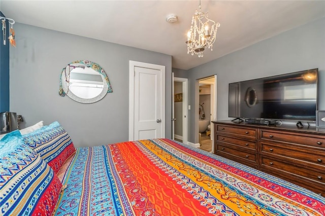 bedroom featuring a chandelier