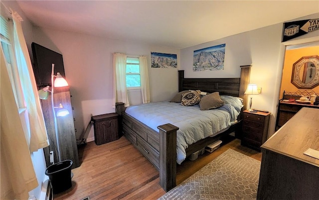 bedroom with light hardwood / wood-style flooring