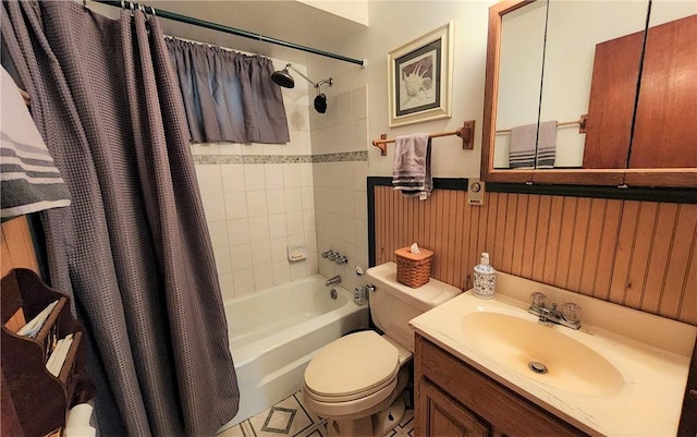 full bathroom with shower / bath combo, wood walls, toilet, and vanity