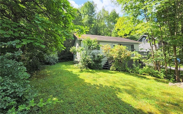 view of yard with a deck