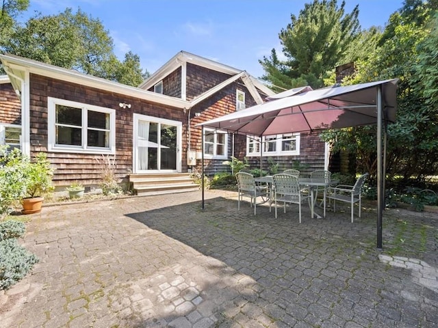 rear view of property with a patio