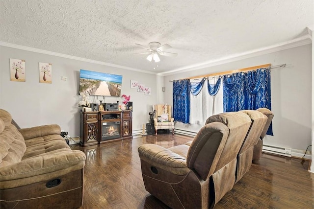 living room featuring dark hardwood / wood-style floors, ceiling fan, ornamental molding, and a textured ceiling