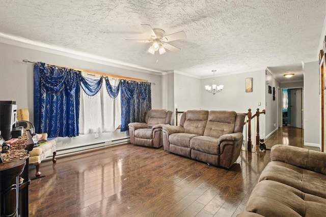 living room with hardwood / wood-style floors, a baseboard heating unit, ceiling fan with notable chandelier, crown molding, and a textured ceiling