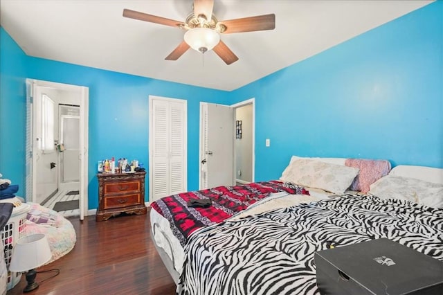 bedroom featuring ceiling fan and dark wood-type flooring