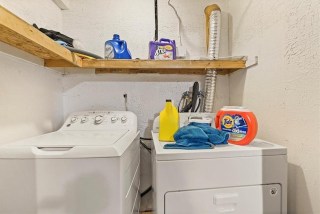 laundry room with independent washer and dryer