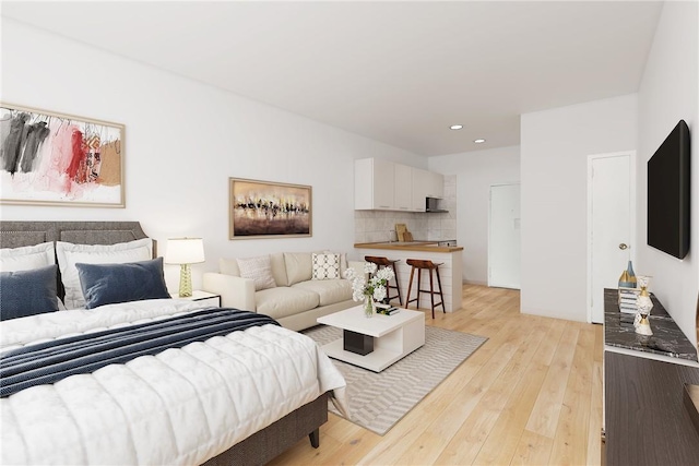 bedroom featuring light hardwood / wood-style floors