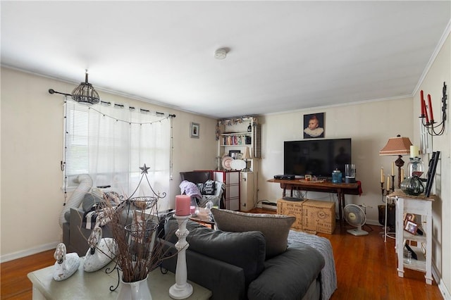 living room featuring hardwood / wood-style floors and ornamental molding