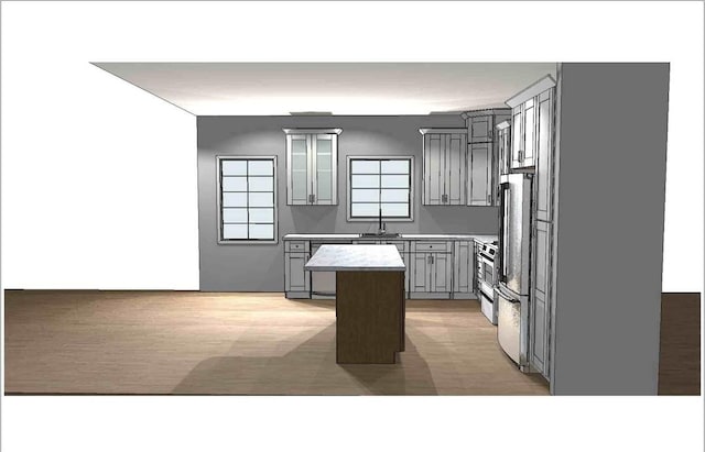 kitchen with gray cabinets, a center island, wood-type flooring, and sink