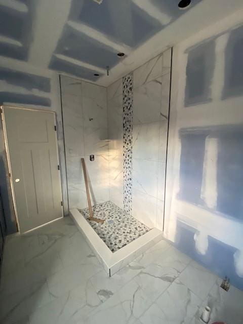 bathroom featuring a shower