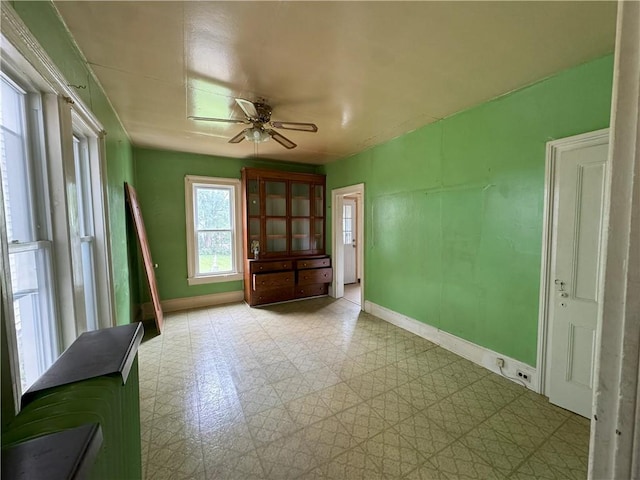 spare room with ceiling fan