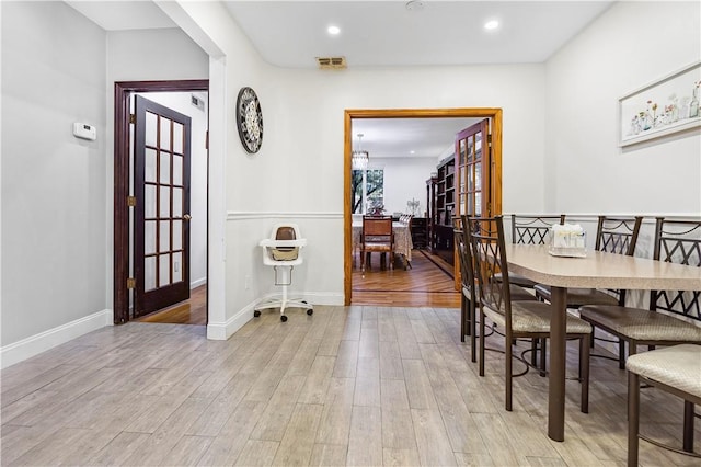 dining room featuring light wood-type flooring