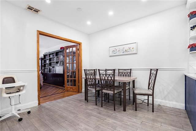 dining area featuring light hardwood / wood-style floors