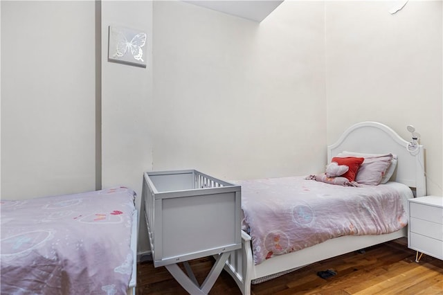 bedroom featuring hardwood / wood-style floors