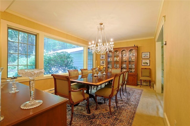 carpeted dining space with baseboard heating, crown molding, and a chandelier