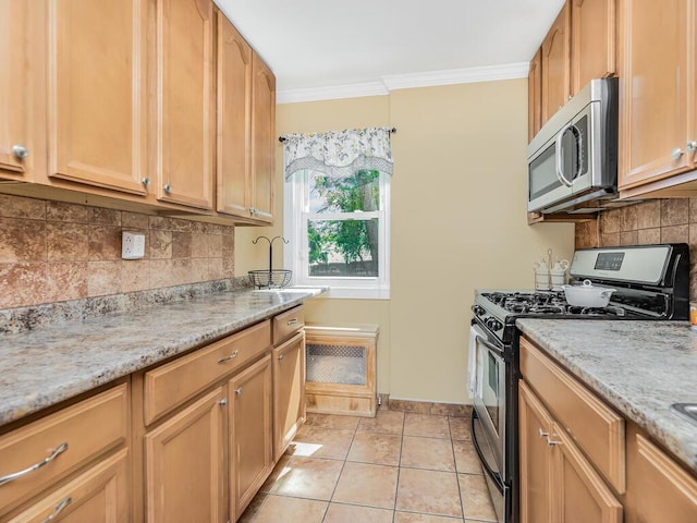 kitchen featuring decorative backsplash, light stone countertops, ornamental molding, appliances with stainless steel finishes, and light tile patterned flooring