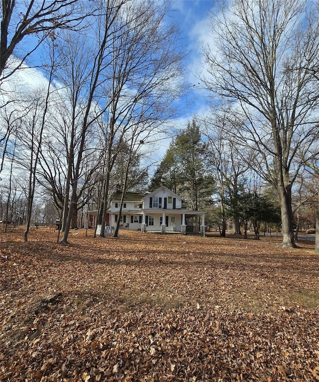 view of yard featuring a porch