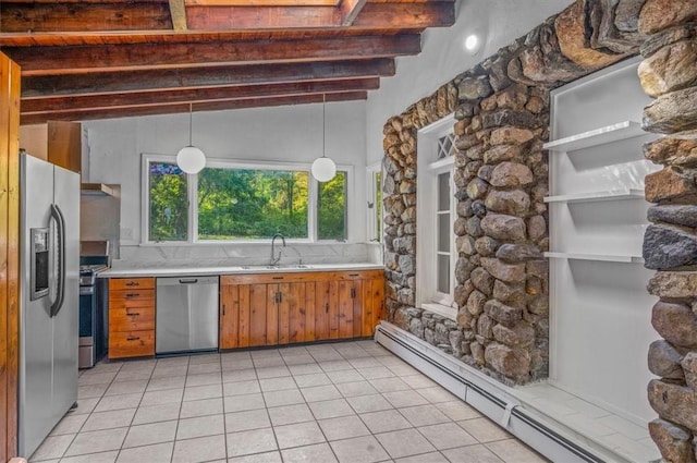 kitchen featuring sink, hanging light fixtures, stainless steel appliances, baseboard heating, and light tile patterned floors