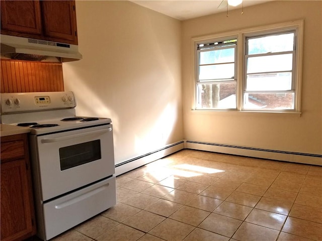 kitchen featuring a baseboard radiator, white electric stove, and light tile patterned flooring