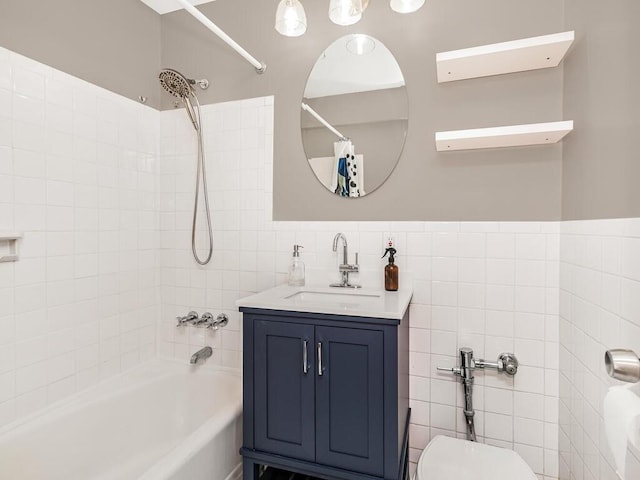 3065 Sedgwick Ave Unit 3A, Bronx, NY 10468 - bathroom featuring shower / bath combo with shower curtain, tile walls, vanity, and toilet